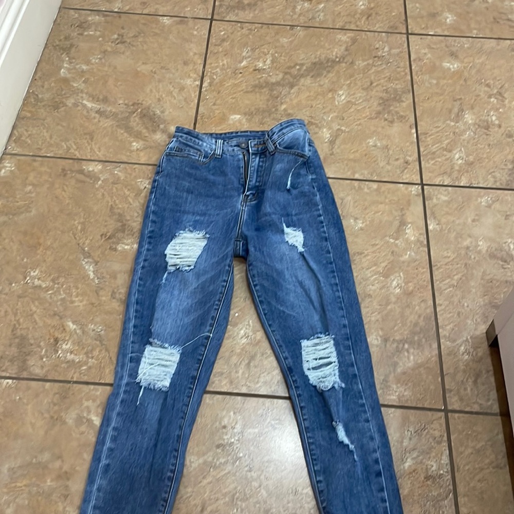 Blue ripped jeans